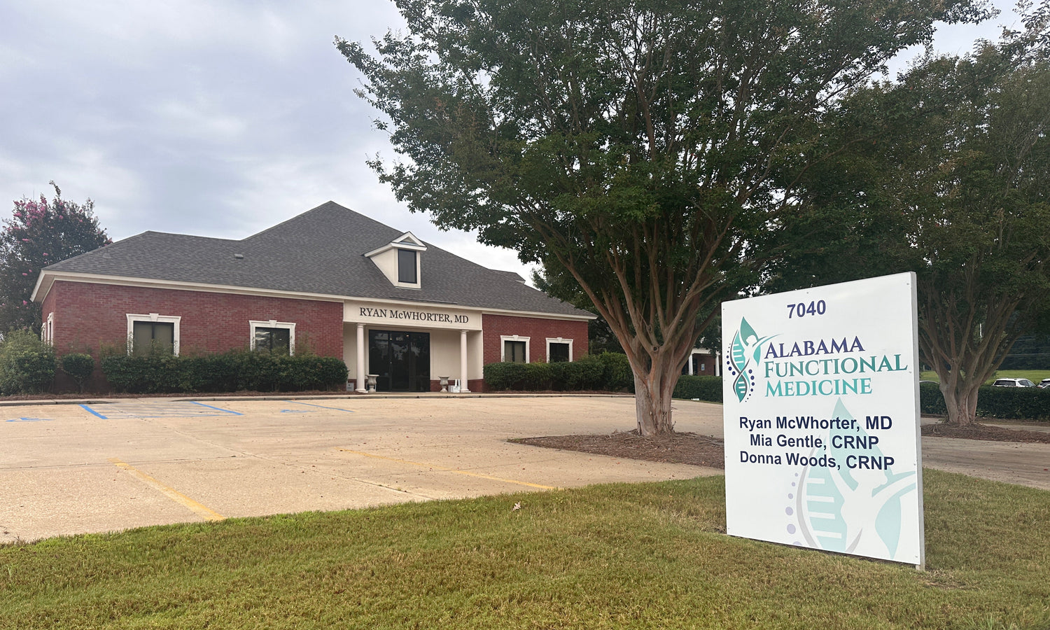 Alabama Functional Medicine sign with logo and provider names; Ryan McWhorter MD, Mia Gentle CRNP, Donna Woods CRNP. Plus, a brick building with "Ryan McWhorter, MD" above the glass double doors.
